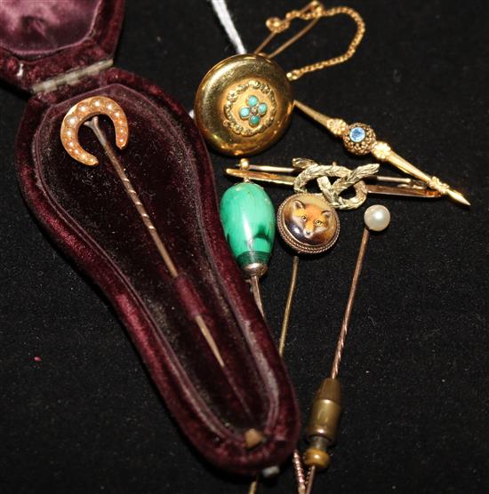 Four late Victorian stick pins, a gold and turquoise locket stud and two bar brooches.